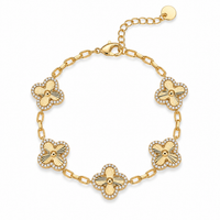 Pulsera Aurelia dorada con cinco motivos florales